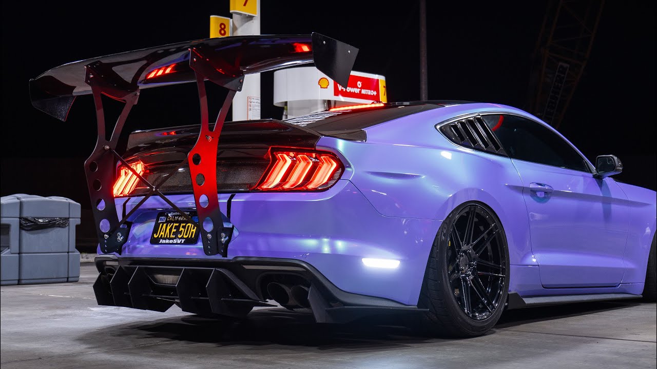 Why Big Wings Became Car Culture's Most Polarizing Mod: The Downforce vs. Flex Debate