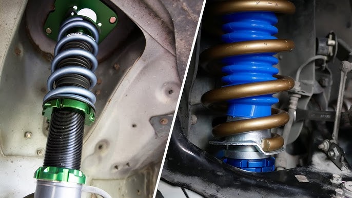 Close-up of a bright red adjustable coilover suspension coil mounted on a modified car's front strut
