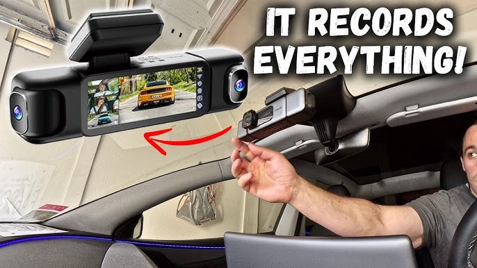 Dash cam mounted behind the rearview mirror recording a car's dashboard and windshield view