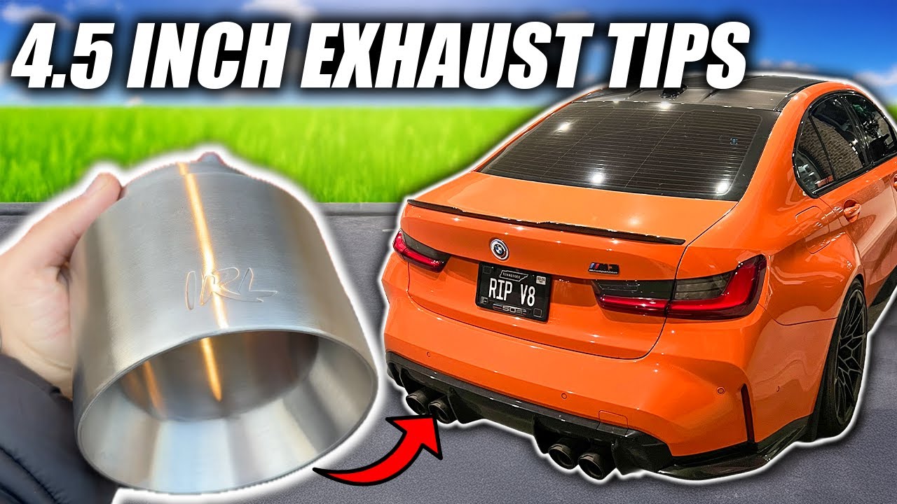 Close-up of an oversized aftermarket exhaust tip on a modified car